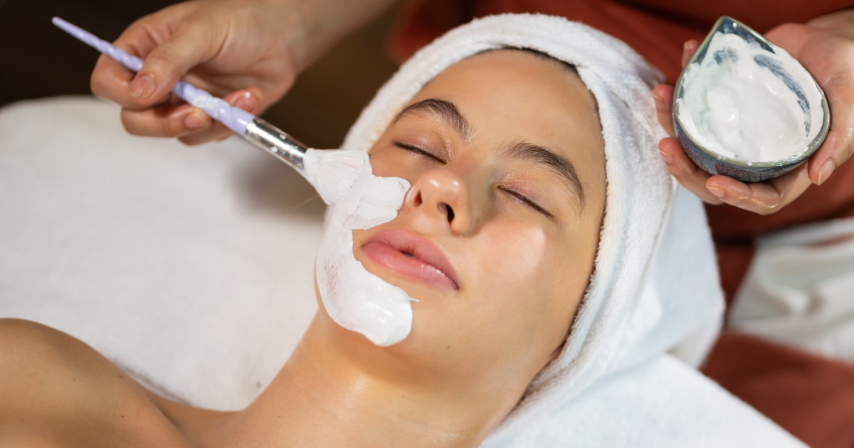 Woman receiving a customized facial from a doctor in Warren, OH